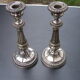 Pair of silver metal candle holders