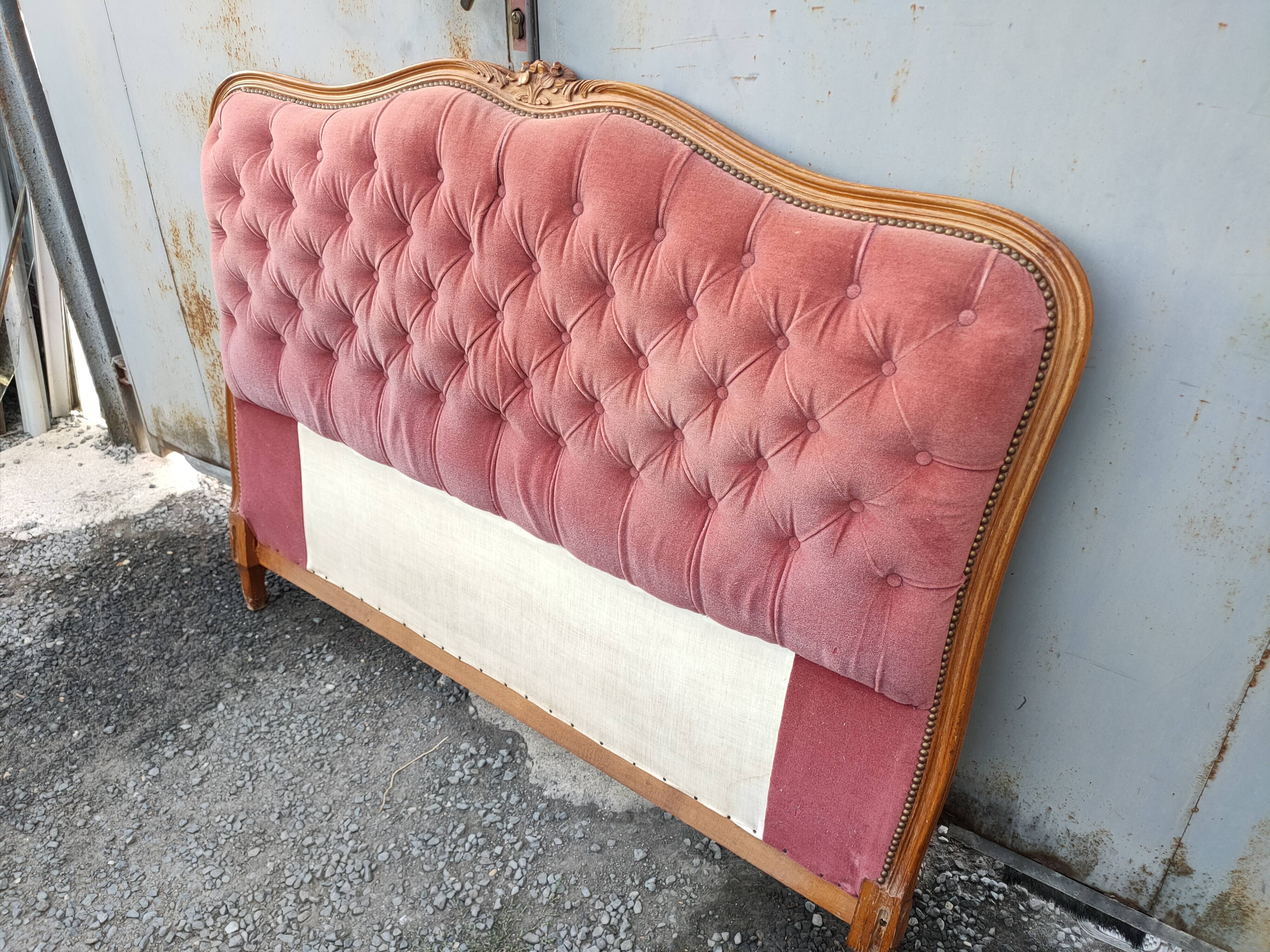 antique wooden and fabric headboard