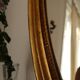 Golden oval mirror - 72x52cm