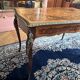 Desk, rosewood marquetry table, bronze ornaments dating from the late 19th century.
