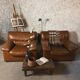 Pair camel leather armchairs