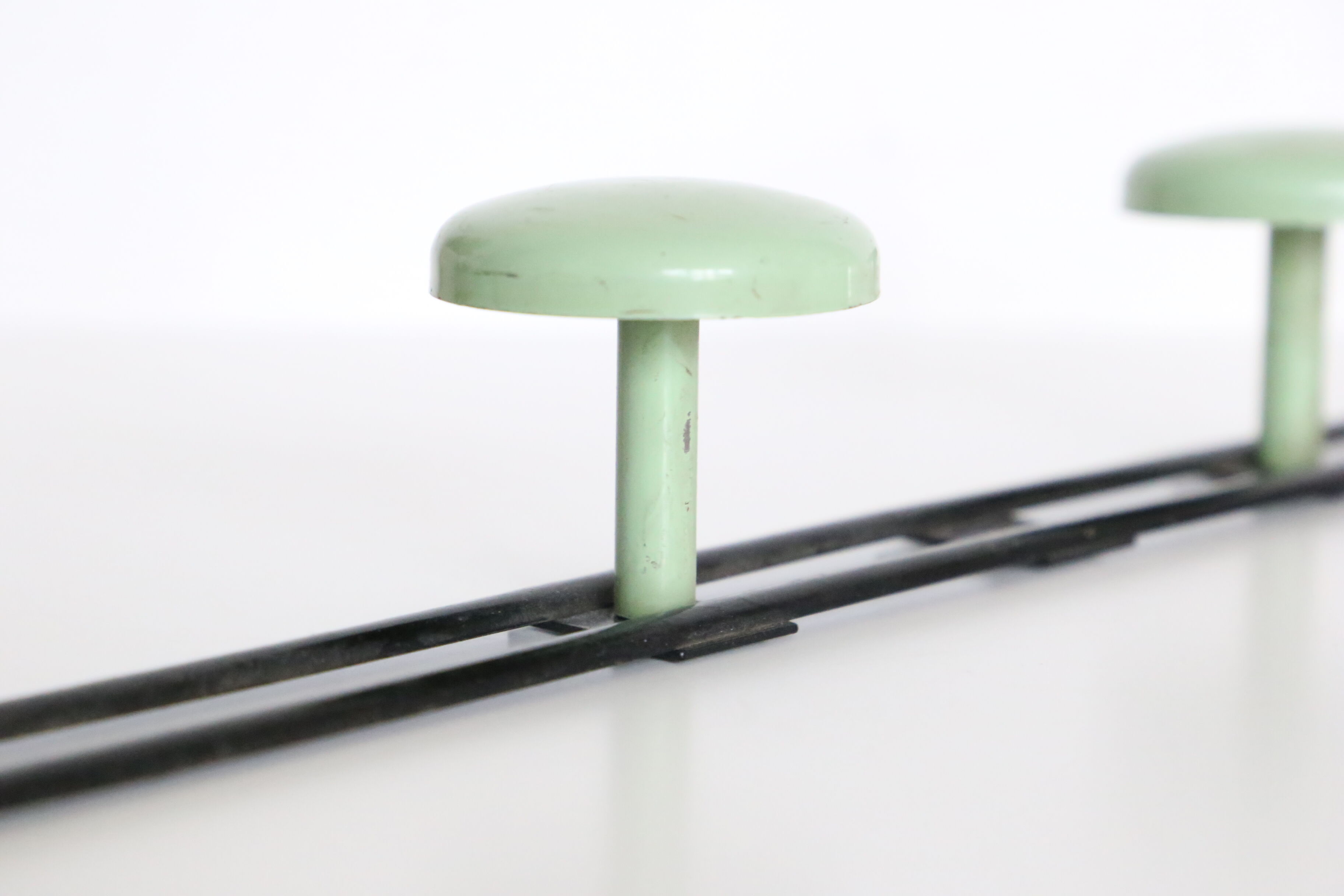 Metal, green and black, vintage wall coat holder