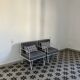 Vintage white metal Croisette style armchairs with hairpin legs in superb condition