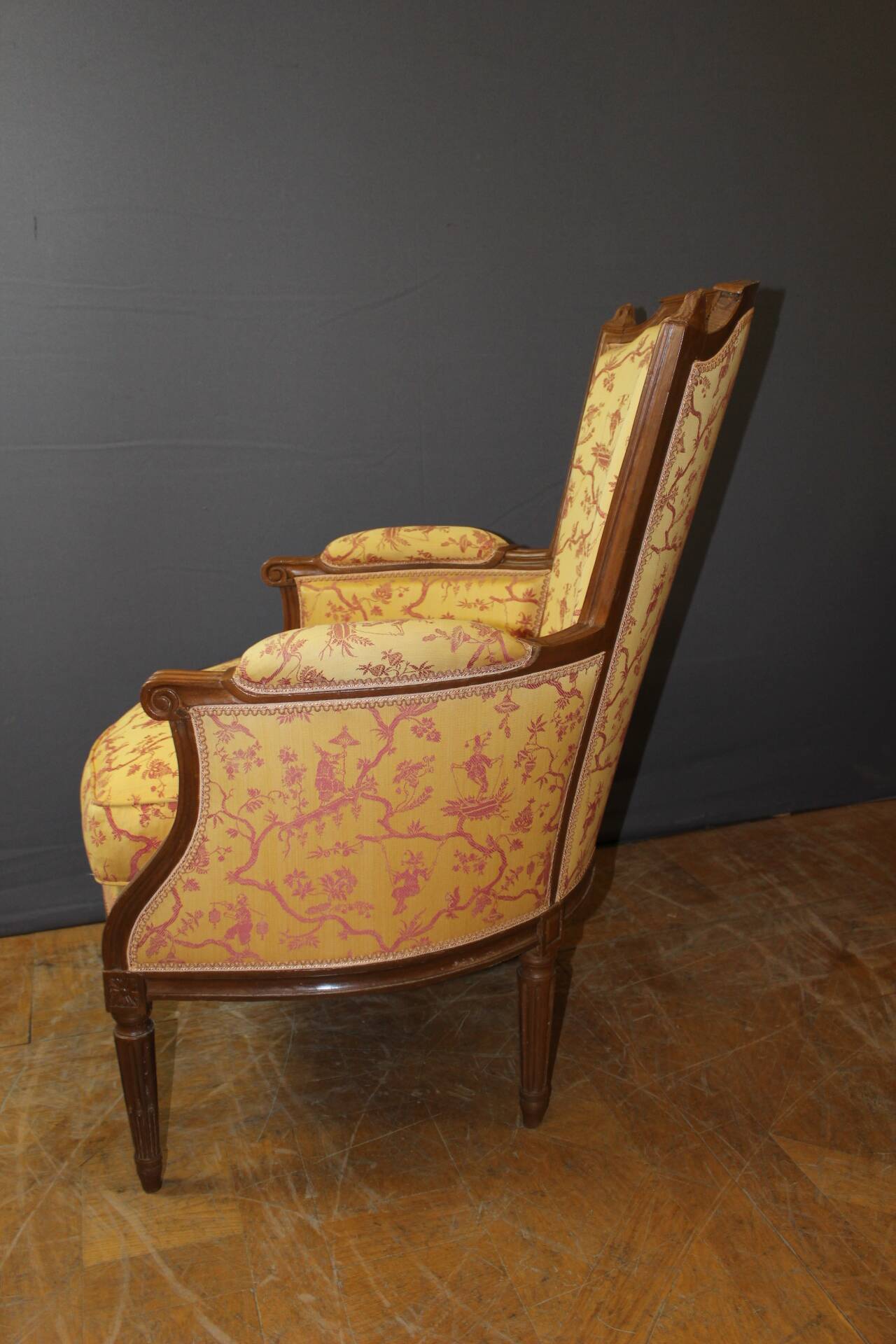 Pair of Louis XVI Bergères in walnut, late 18th century.