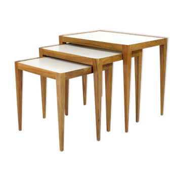 Three walnut side tables from the 60s