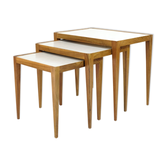 Three walnut side tables from the 60s