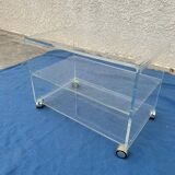 Table basse/ meuble tu en plexiglas vintage sur roulettes