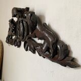 Antique carved wooden pediment with lions and medallion