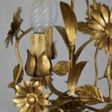 golden chandeliers with flowers.