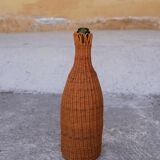 Bouteille en rotin vintage