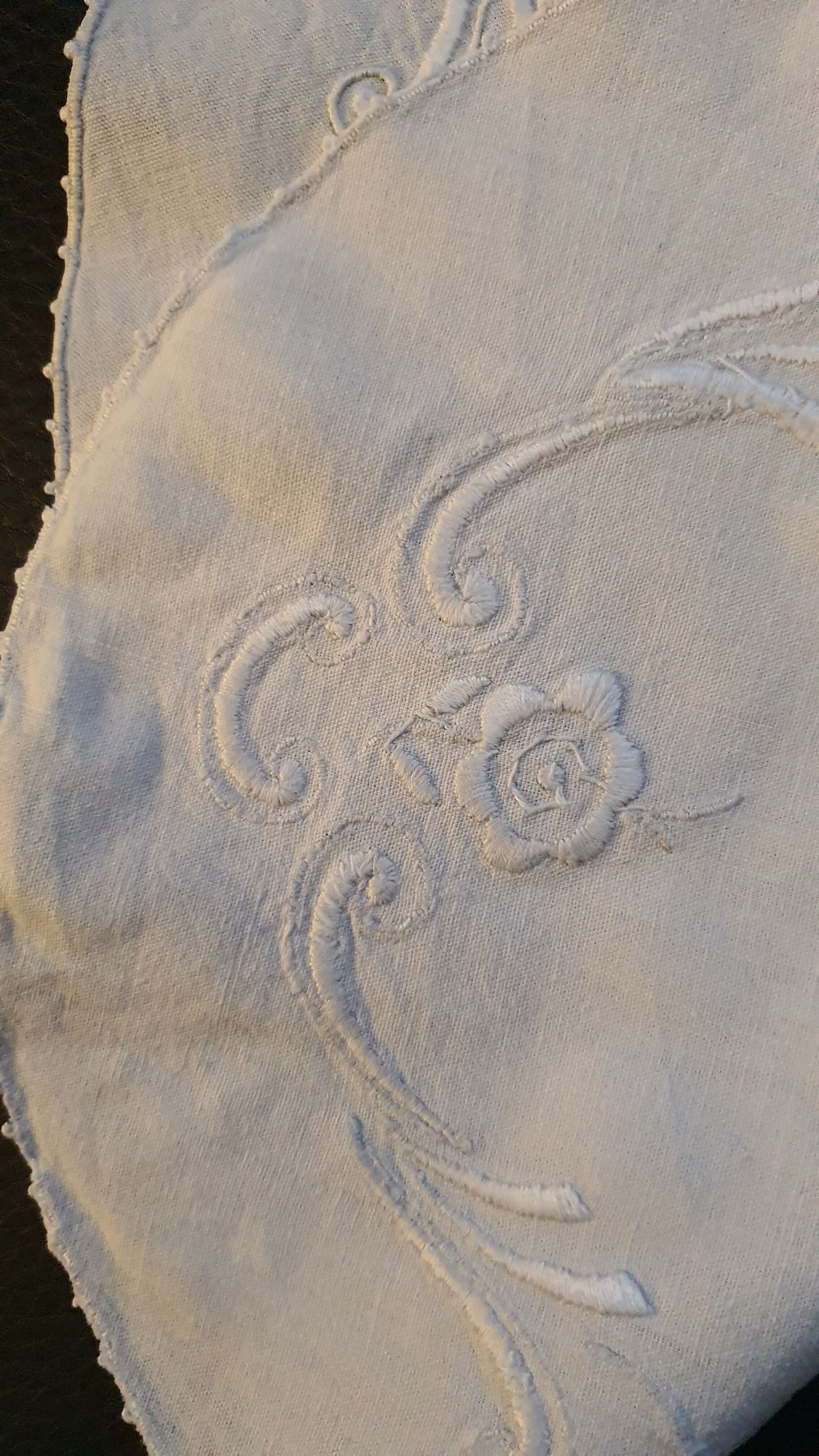 Hand-embroidered oval placemat