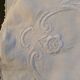 Hand-embroidered oval placemat