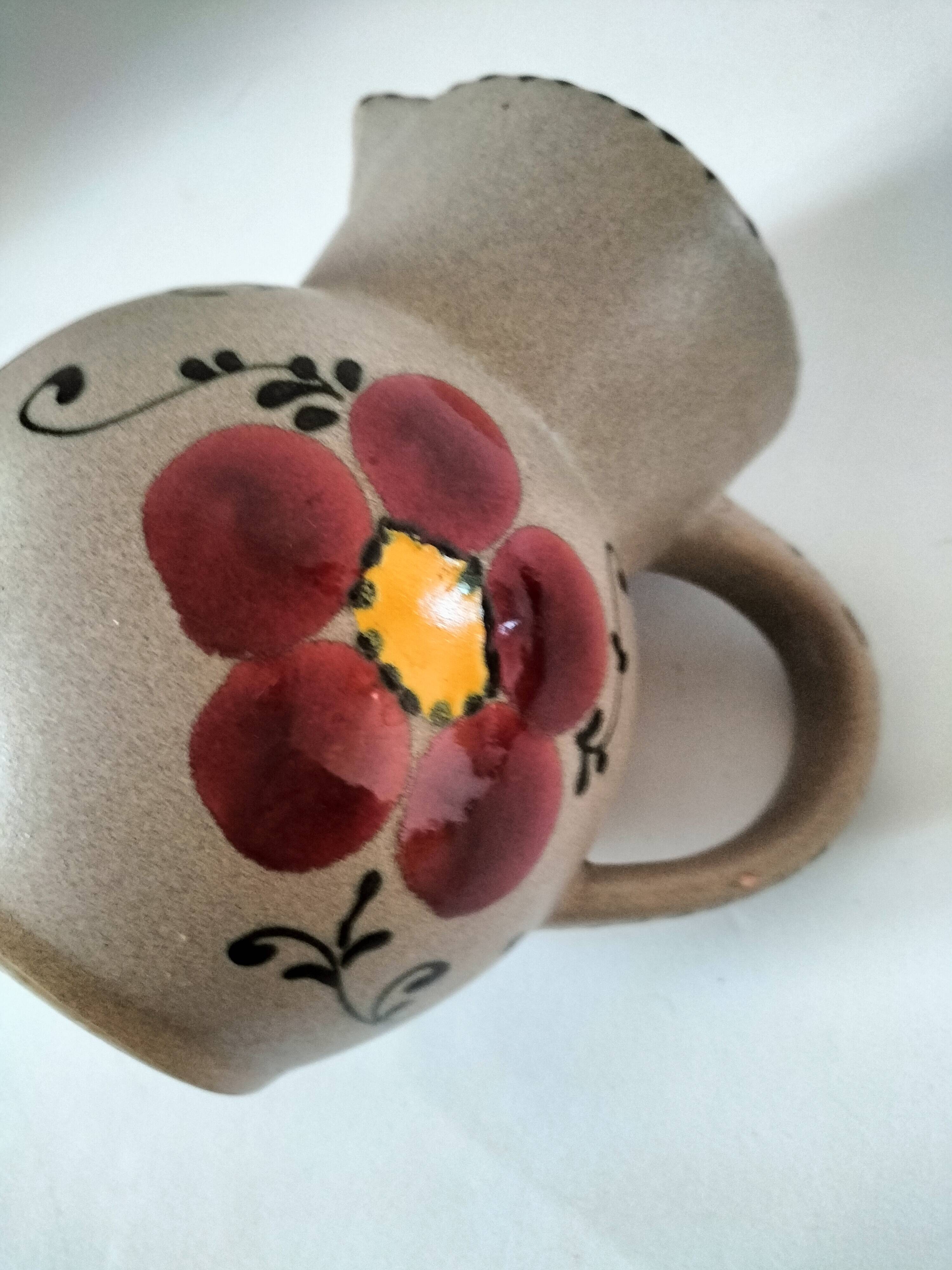 Vintage stoneware pitcher with hand-painted floral decoration, 1960s–70s