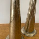 Pair of hammered metal candlesticks