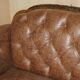 Chesterfield Regency 1810 antique canapé restored in leather with a carved frame.