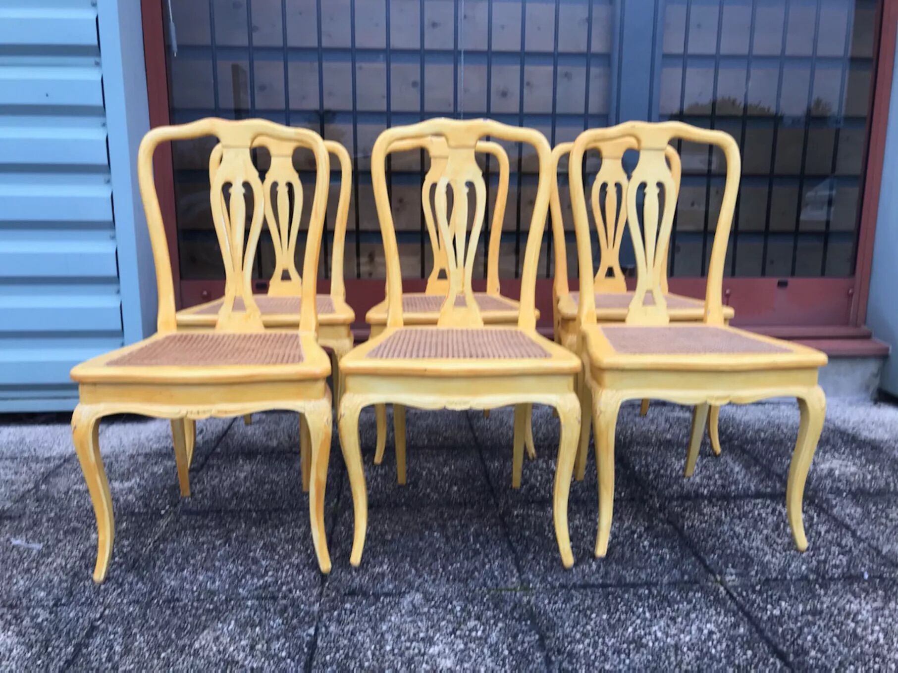 6 yellow canned chairs
