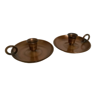 Pair of antique copper cellar rat candlesticks