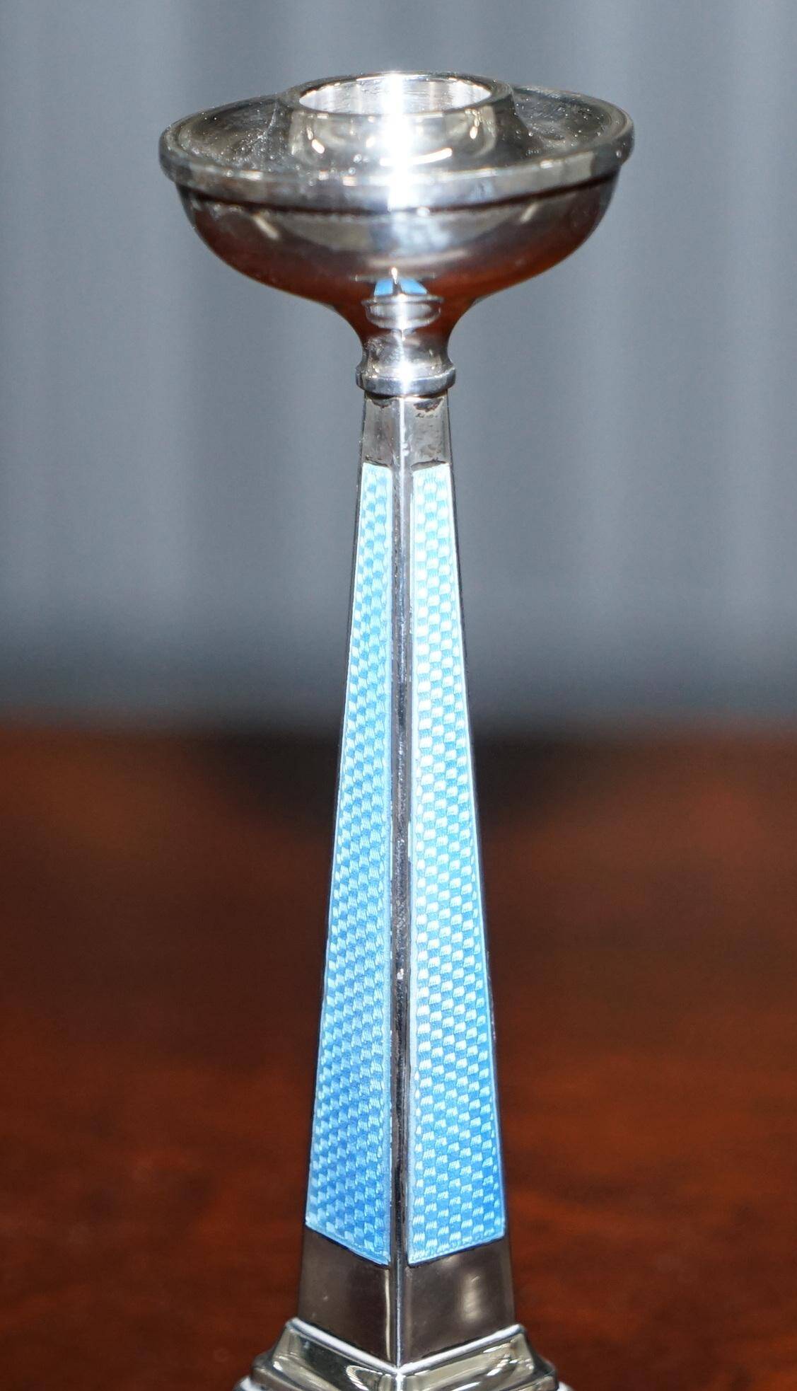 Pair of sterling silver and enamel candlesticks 1927 by Charles Green & Co.