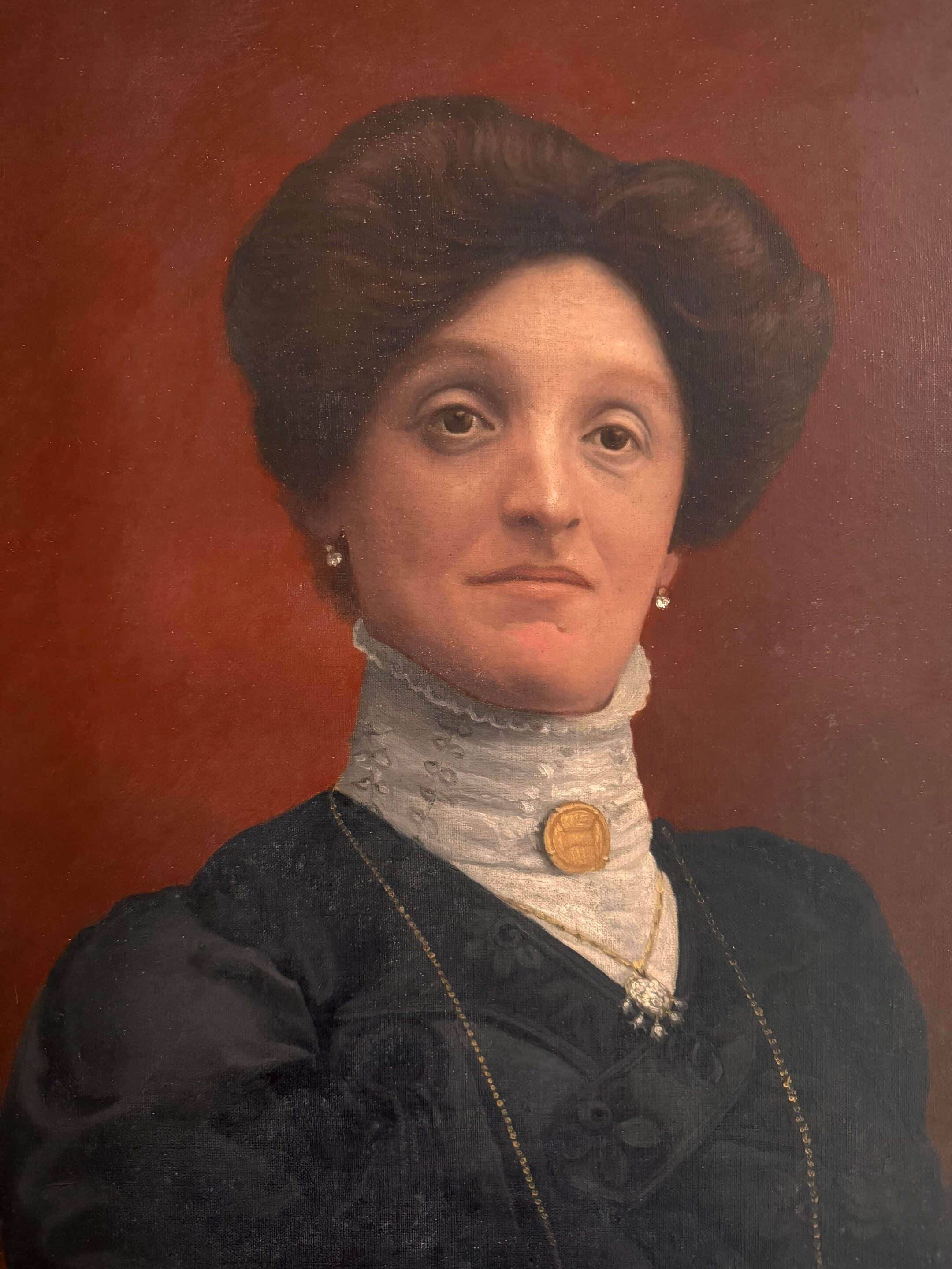 Old painting, portrait of a woman from the early 20th century.