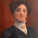 Old painting, portrait of a woman from the early 20th century.