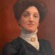 Old painting, portrait of a woman from the early 20th century.