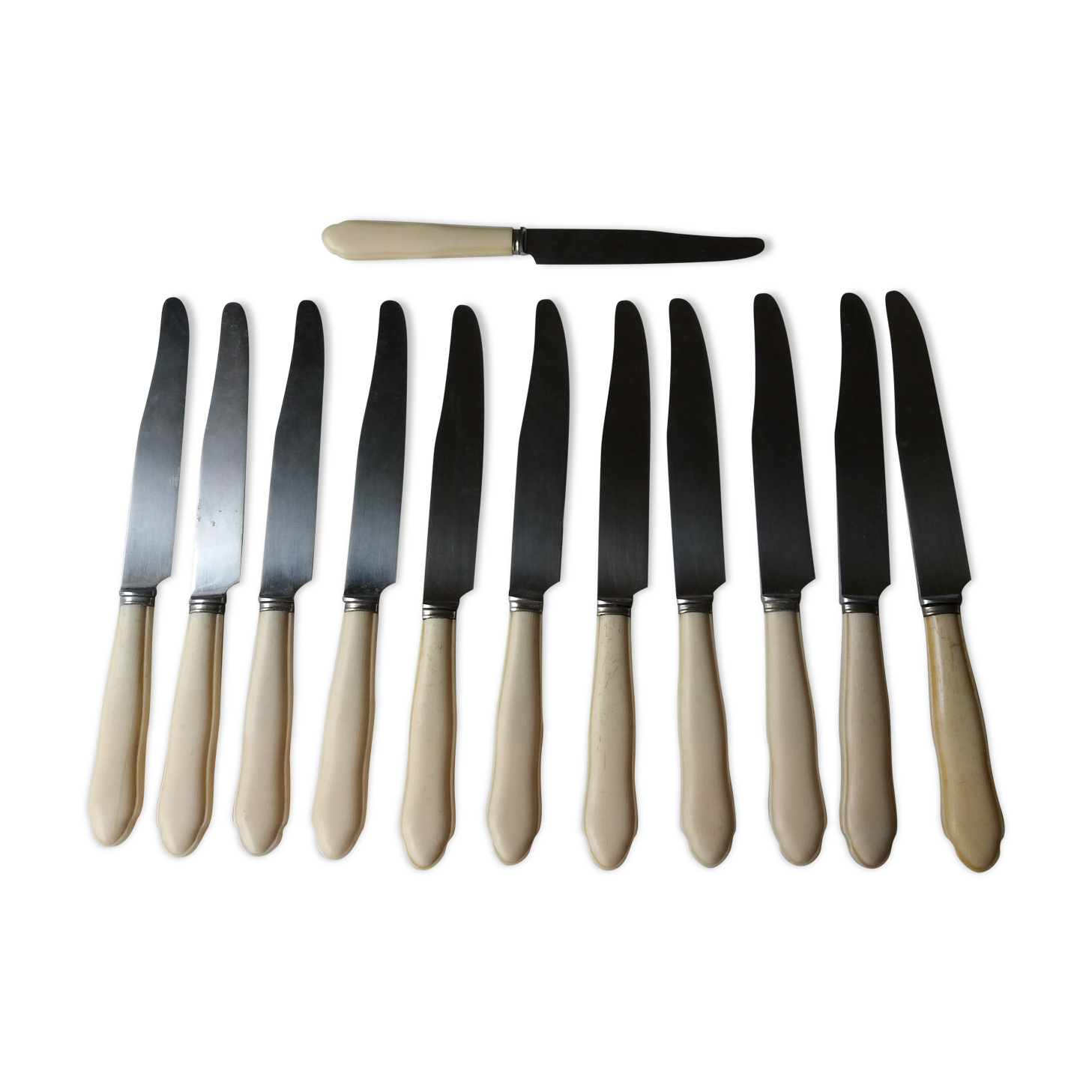 Set of twelve art deco knives with ivory handle