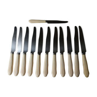 Set of twelve art deco knives with ivory handle