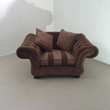 Large weighty love seat with the original matching cushions. Marked "Handmade in Holland"