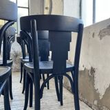 Set of 7 black bistro chairs