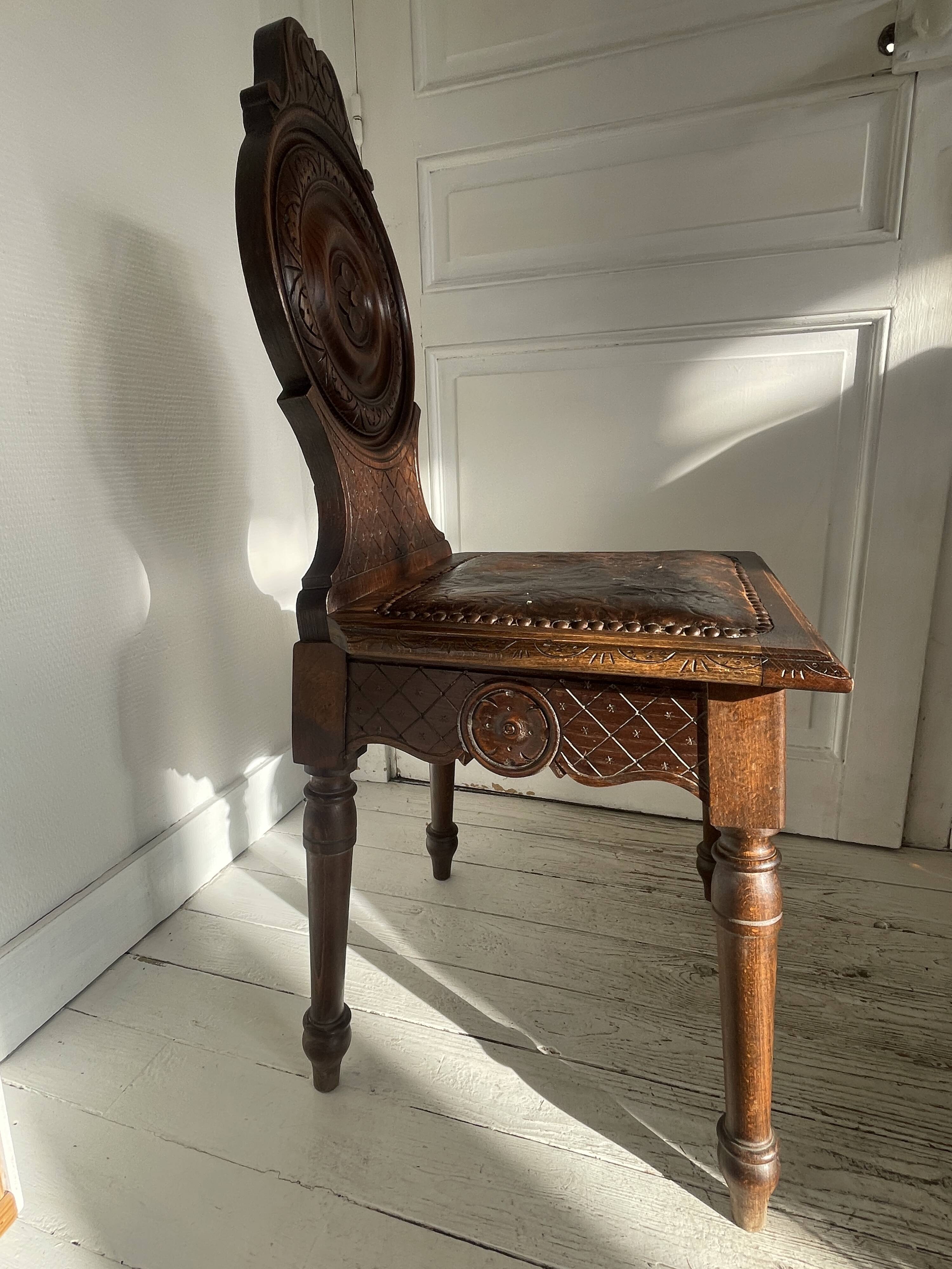 Wooden chair with Breton leather seat