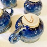 Part of a signed enameled stoneware coffee service