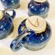 Part of a signed enameled stoneware coffee service