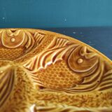 Vintage French amber oyster plate in Majolica decorated with fishes