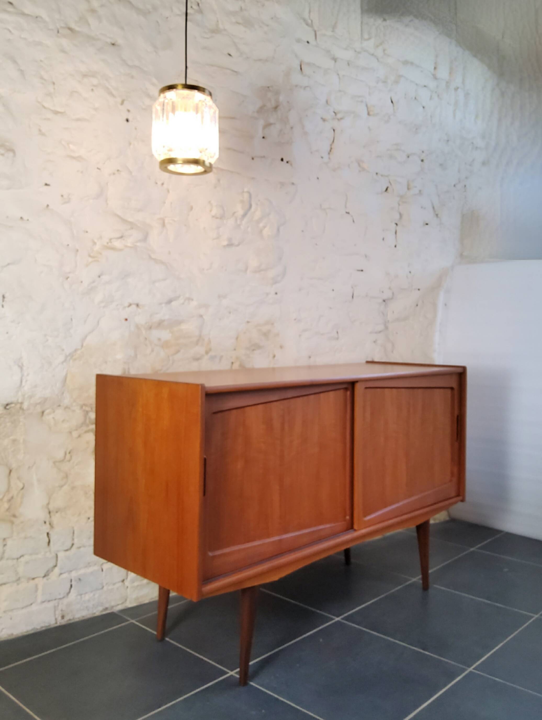 Scandinavian sideboard with sliding doors and drawers - teak