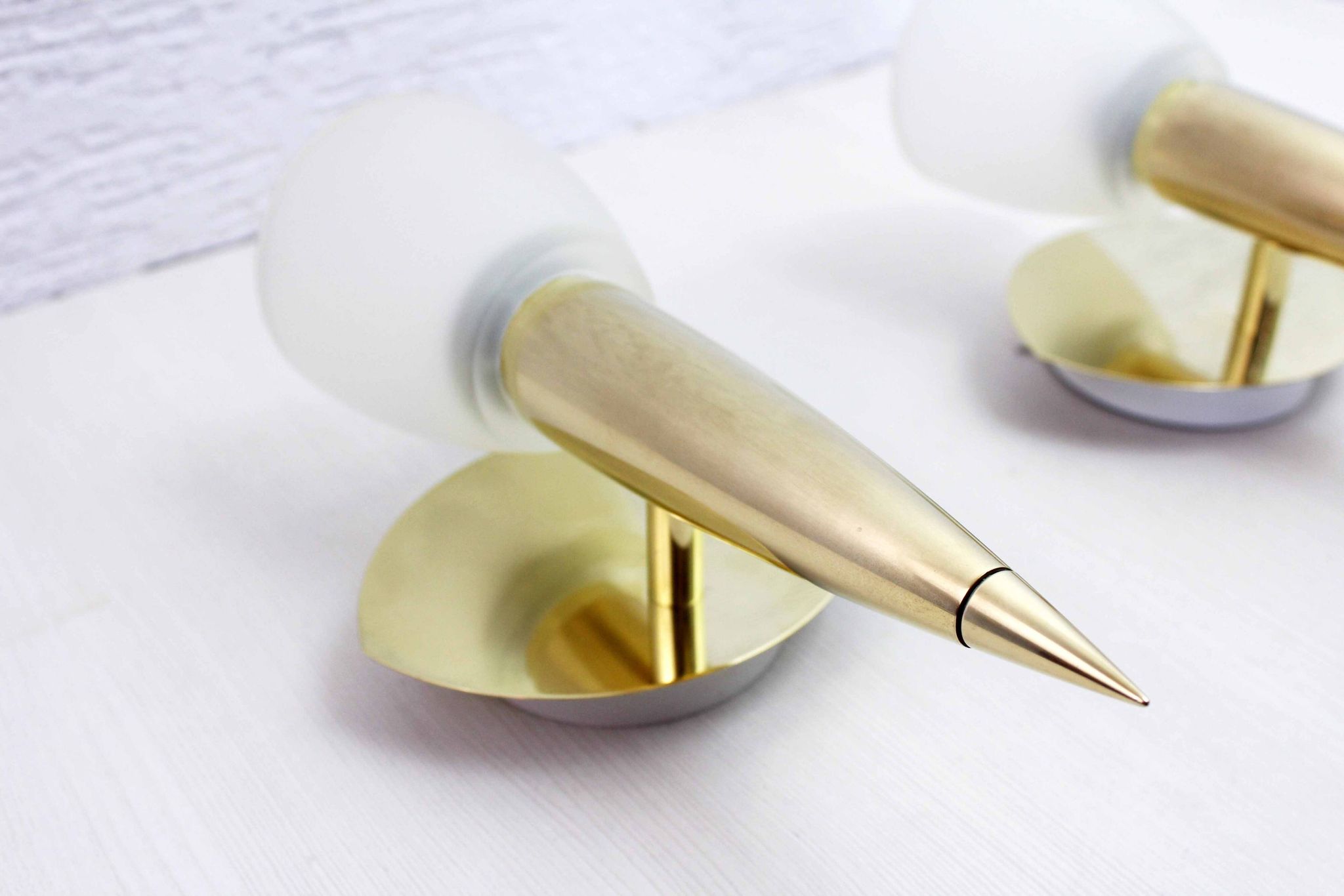 Pair of leola brass and glass wall lights, italy 1970