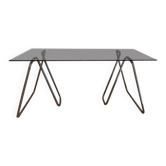 Bureau en verre fumé et sur trétaux tubulaires en chrome design 1970