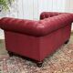Chesterfield 2-seater leather sofa, modern production from the 2000s.
