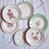 Flat antique earthenware plates with gilded edges