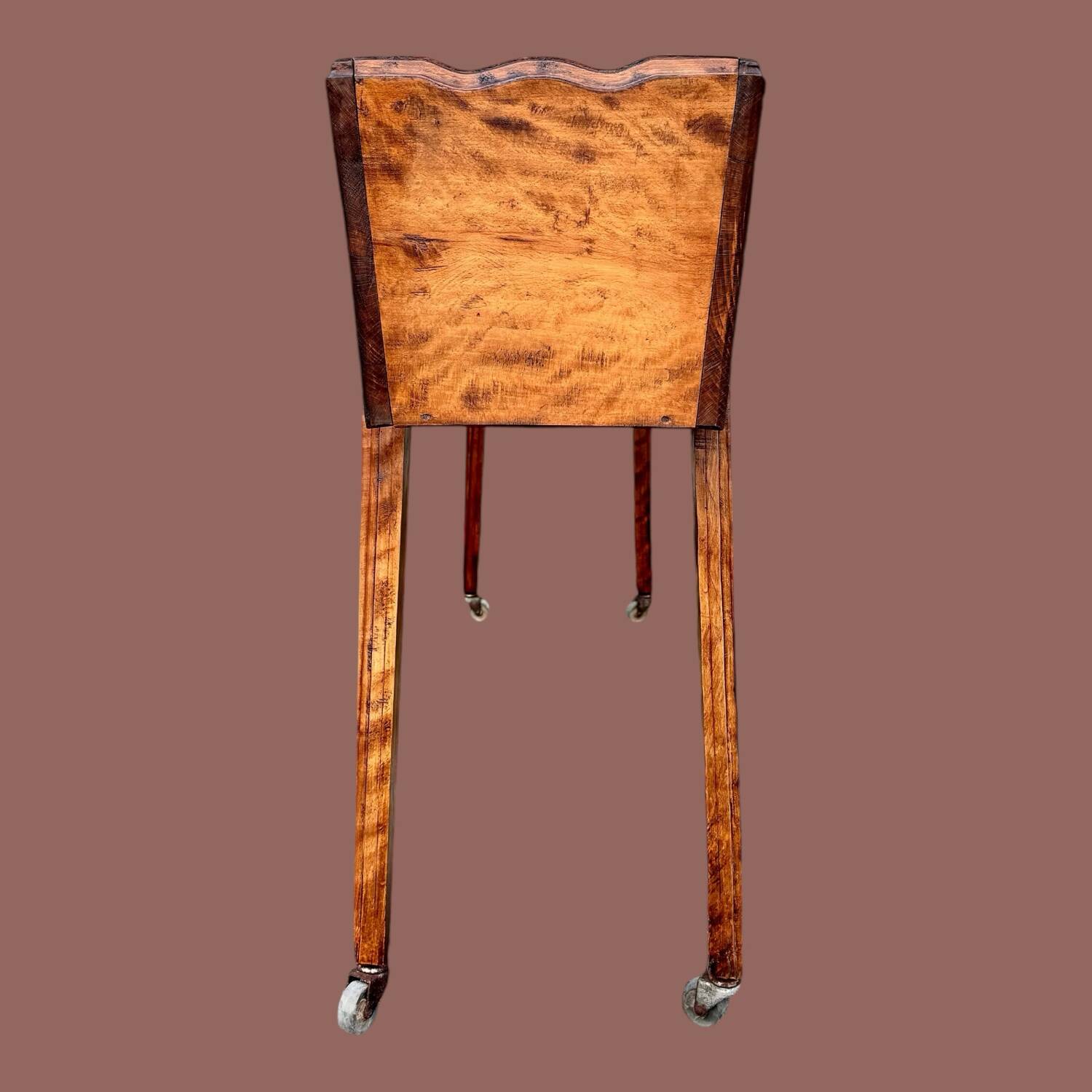 Old indoor planter on wheels