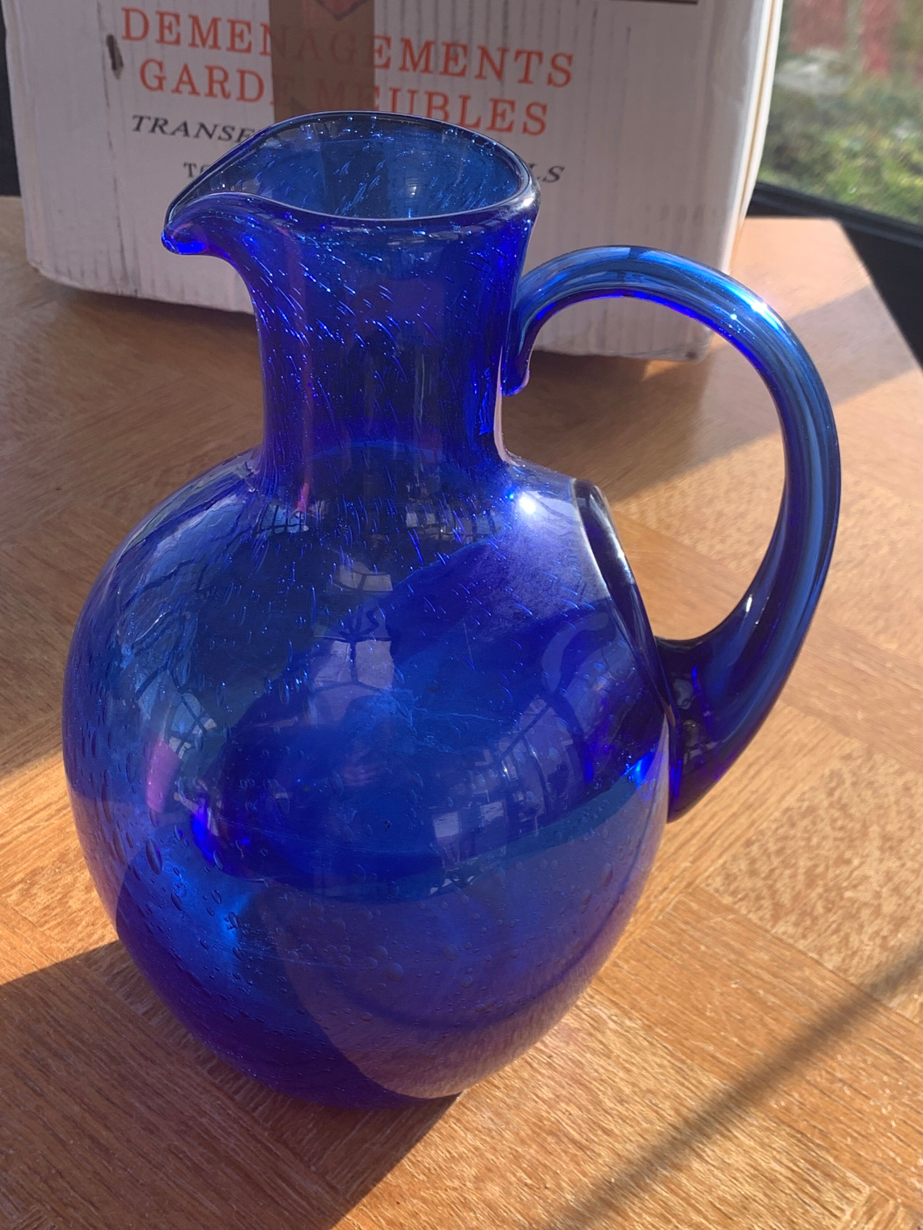 Blue blown glass ice decanter from vintage biot glassware