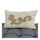 Cushion in vintage fabric with ornamentation