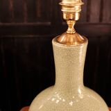 Ceramic lamp with a crackled celadon green finish.