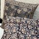 Indian cotton block print cushion with “flower” pattern - indigo blue