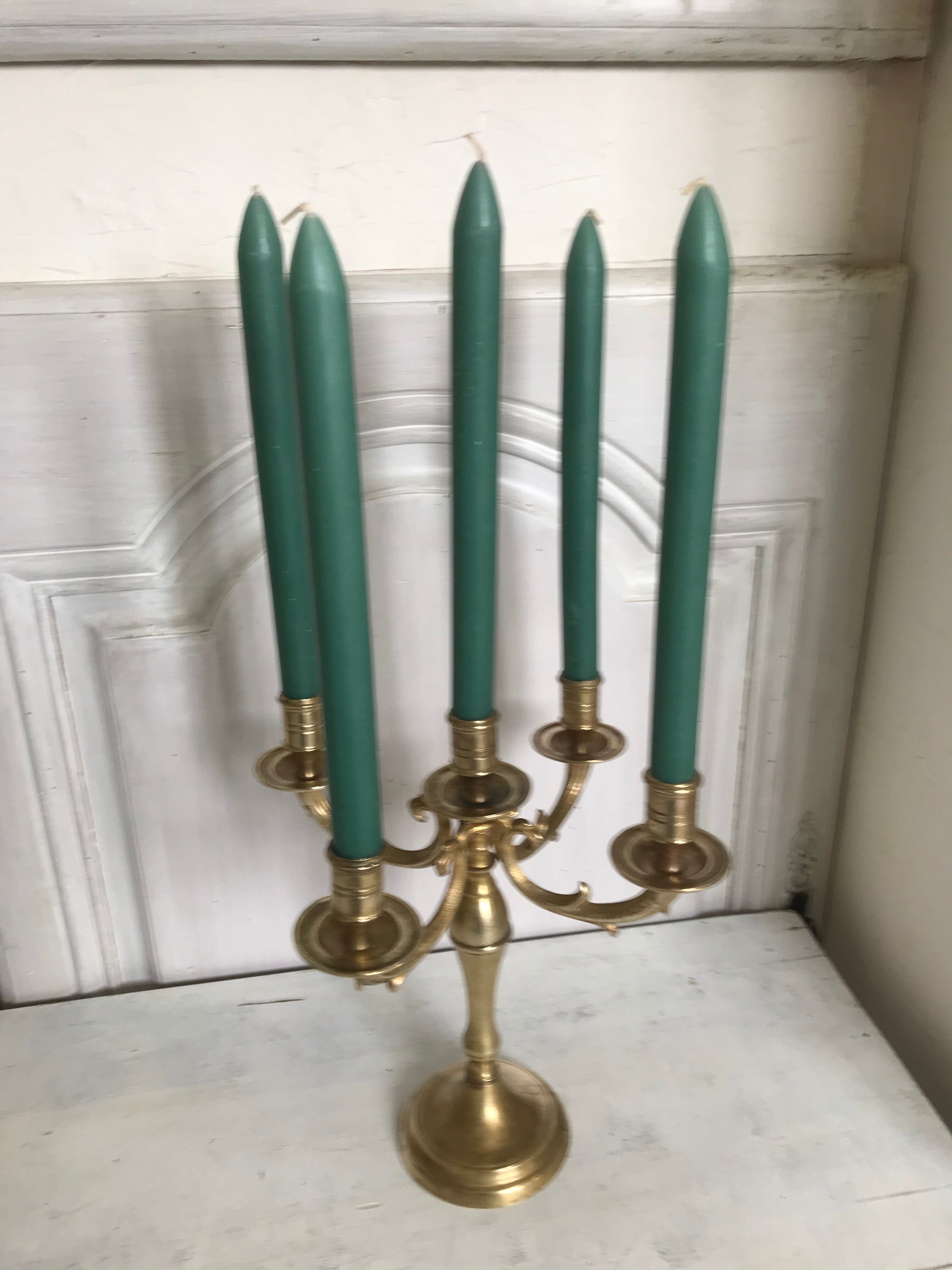 Ancient gilded bronze candlestick