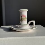 Small vintage hand-held candlestick in earthenware with green trim and floral decoration H10.5