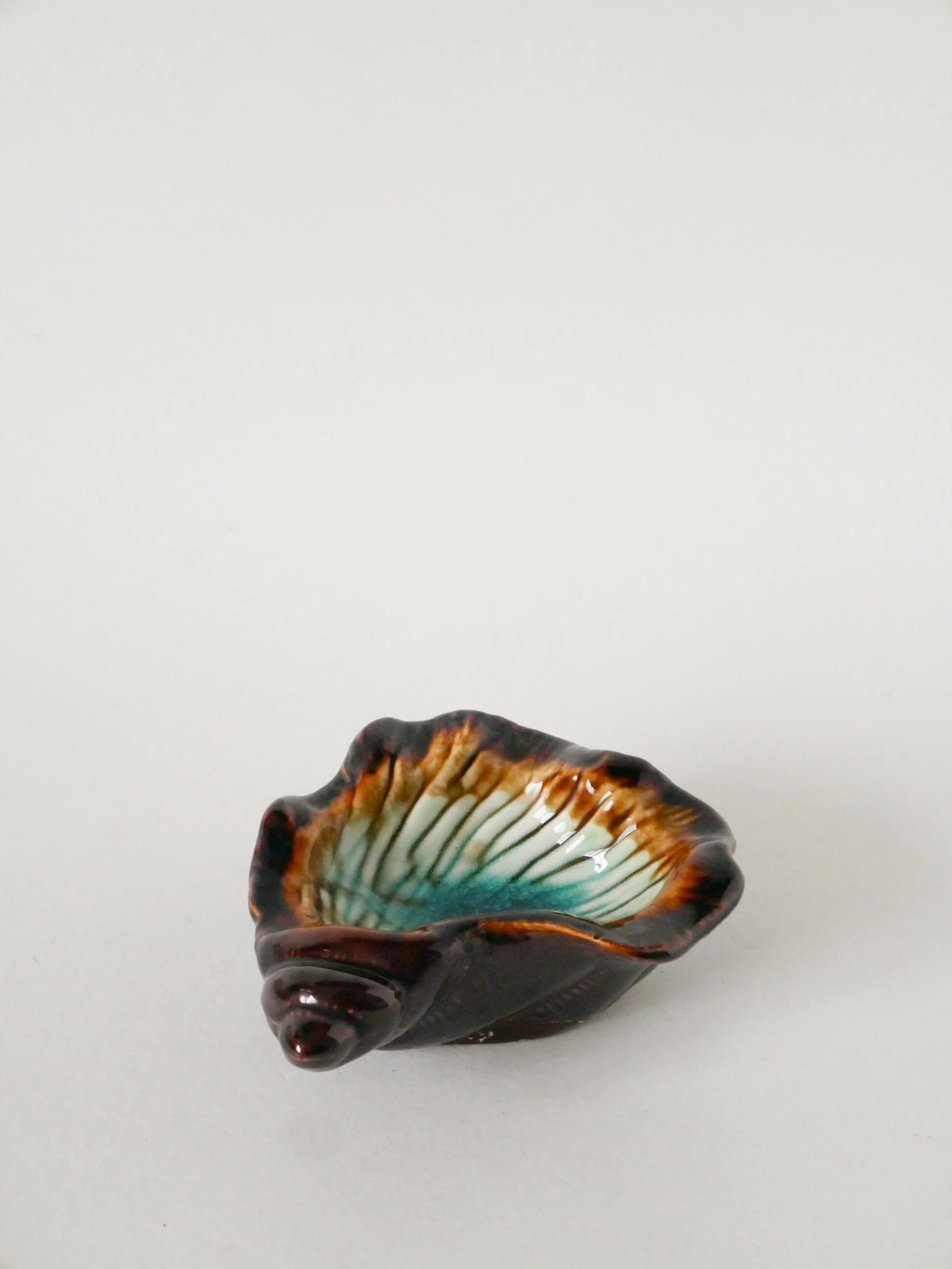 Ceramic shell-shaped catchall, brown and blue, 1970.