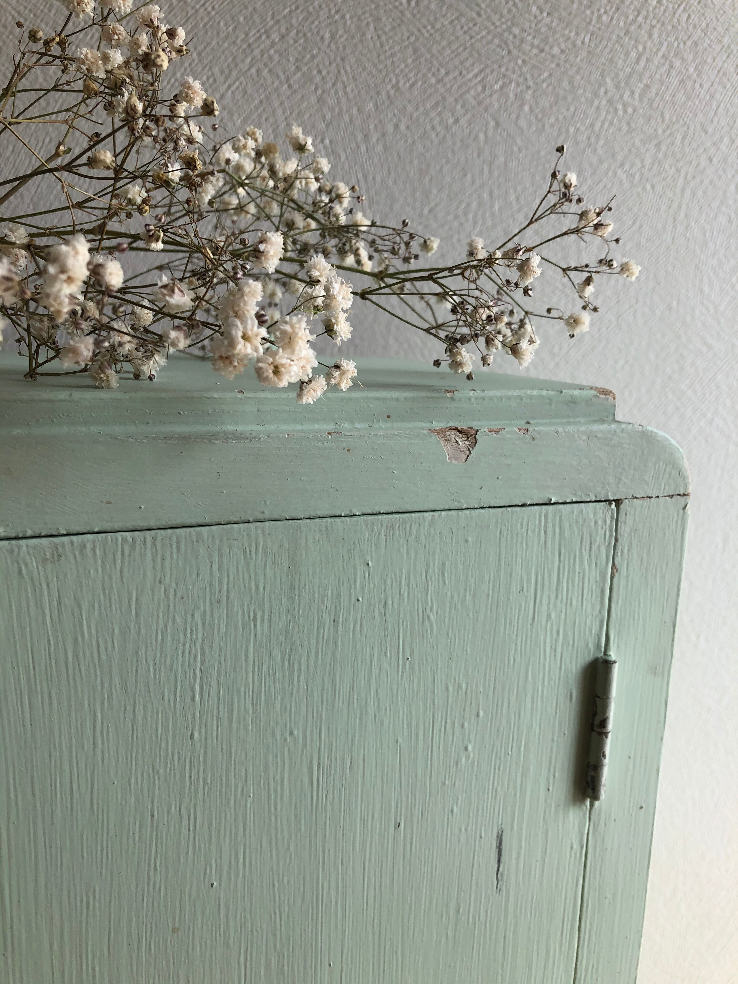 Patinated medicine cabinet