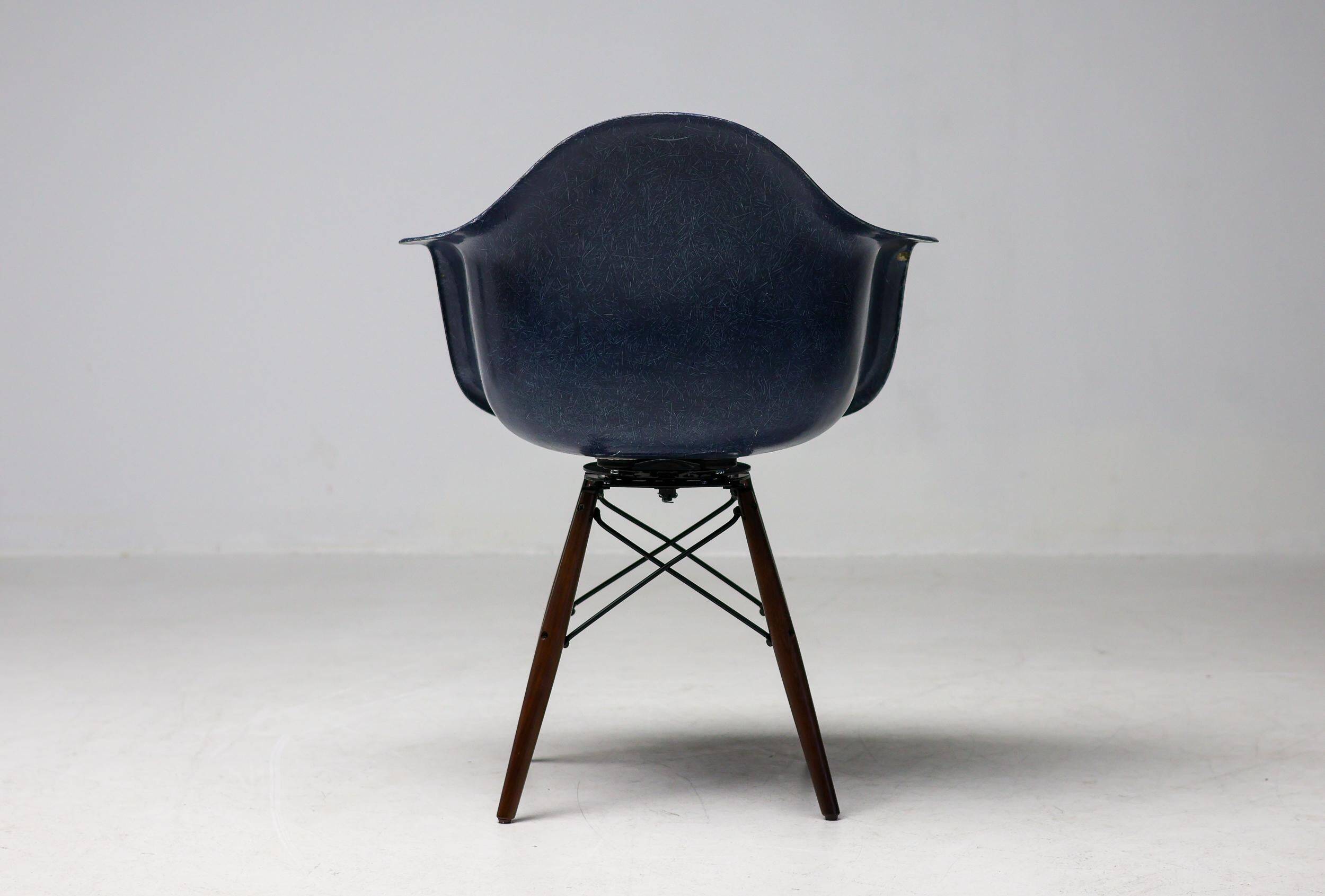 Indigo blue Charles Eames "PAW" armchair by Herman Miller, mid-century modern.