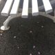 Old garden bench, cast iron feet and white wooden slats