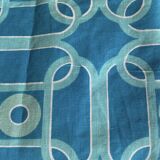 Vintage square cotton tablecloth with graphic patterns.
